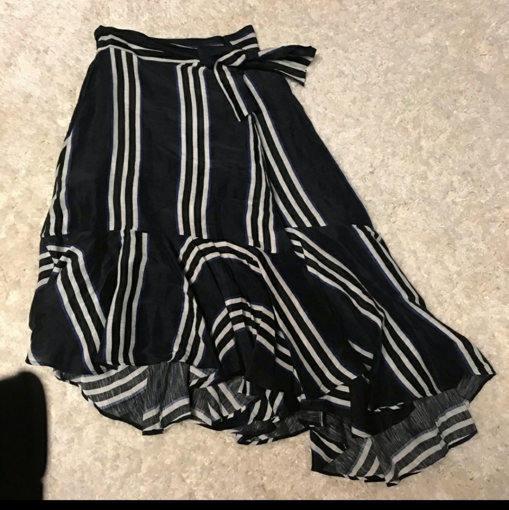 A piece-apart high low silk wrap skirt